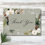 Rustic Snowfall Pine & White Floral Sage Wedding Thank You Card<br><div class="desc">Envelop your guests in the serene beauty of winter with our exquisite wedding thank you card. A calming dusty sage backdrop creates a peaceful canvas for a stunning arrangement of fresh green pine sprigs, soft cream-coloured blooms, and rustic brown pinecones. This natural masterpiece is adorned with a delicate snowfall of...</div>