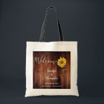 Rustic sunflower on wood Welcome wedding Tote Bag<br><div class="desc">Rustic sunflower on barn wood wedding welcome tote bag.
Nice welcome bag for your wedding guests.
Add your own names and text and create a very personal and unique wedding bag.</div>