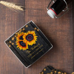 Rustic sunflowers barn wood lights wedding favour glass coaster<br><div class="desc">Rustic country vintage traditional style personalized drink coaster with big yellow gold sunflowers and strings of twinkle lights on a dark brown barn wood background and with elegant gold typography script.             Newlyweds gift or favour for summer or autumn fall | elegant rustic country | outdoor garden backyard themed weddings.</div>