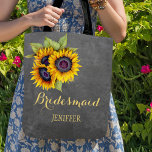 Rustic sunflowers chalkboard wedding bridesmaid tote bag<br><div class="desc">Rustic elegant fall wedding stylish bridesmaid / maid of honour / flower girl tote bag on dark grey chalkboard featuring beautiful yellow gold sunflowers bouquets . Personalize it with bridesmaid's name on front and with bride's and groom's names and wedding date on the back. ------- Fill in your information in...</div>