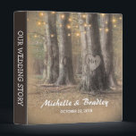 Rustic Tree & String Lights Wedding Story Album Binder<br><div class="desc">Rustic country wedding album featuring an enchanting outdoor woodland wedding setting,  glowing string twinkle lights,  a romantic carved heart on the trunk of a tree with your initials,  your names and wedding date.</div>