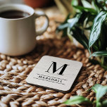 Rustic White Washed Wood Custom Monogram Initial Coaster<br><div class="desc">This simply elegant custom monogrammed beverage coaster set features classic black monogram text that can be personalized with a last name initial and last name. A beautiful keepsake gift for a newlywed couple, family, or new homeowners. A white washed faux wood grain background adds a rustic textured look to the...</div>