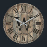 Rustic Williams Family Monogram Clock | Wood-Look<br><div class="desc">Celebrate the Williams family legacy with this stunning rustic monogram wall clock that brings timeless elegance to any home. 🕰️ Featuring a weathered wood-look background with vertical planks, a decorative ornate border, and Roman numerals framing a bold monogram design with a large W initial, the Williams family name in classic...</div>