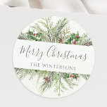 Rustic Winter Greenery Merry Christmas Classic Round Sticker<br><div class="desc">Beautiful envelope seal stickers featuring hand-painted botanical watercolor illustrations of winter greenery,  pine and spruce branches,  cones and holly berries. Makes a great addition to Christmas gifts or as holiday card envelope seals.</div>