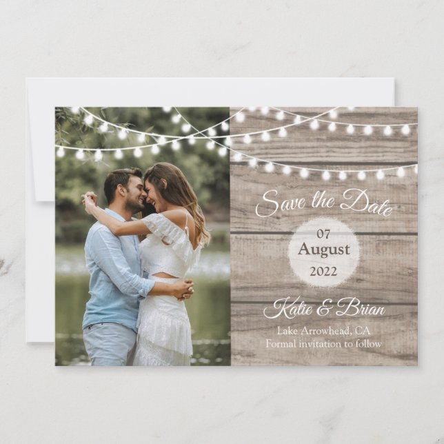Rustic wood and string lights Save the date card (Front)