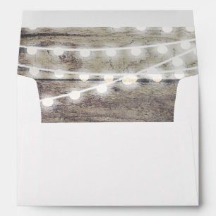 Rustic wood and string lights wedding envelope