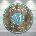 Rustic Wood Blue Family Name  Dartboard<br><div class="desc">This rustic dartboard is the perfect addition to your family beach house, lake house, game room, man cave, and more. It features a bold initial monogram at the centre, with your family name proudly displayed at the top. The bottom reads "Beach House, " but this can be customized to fit...</div>