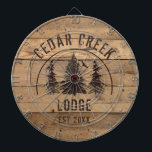 Rustic Wood Forest Trees Property Name Dartboard<br><div class="desc">Rustic themed dartboard personalized with your cabin, lakehouse, lodge or rental property name and established date. The design featuresa wilderness forest pine trees scenic image against a country wood plank background. ASSISTANCE: For help with design modification or personalization, colour change, transferring the design to another product or if you would...</div>