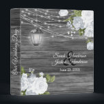 Rustic Wood, Lantern & White Flower Binder<br><div class="desc">Wedding Photo Album or Planner featured in a rustic wood background with beautiful white rose flowers, a glowing lantern and trendy string lights ready for you to personalize. ⭐This Product is 100% Customizable. Graphics and / or text can be added, deleted, moved, resized, changed around, rotated, etc... 99% of my...</div>