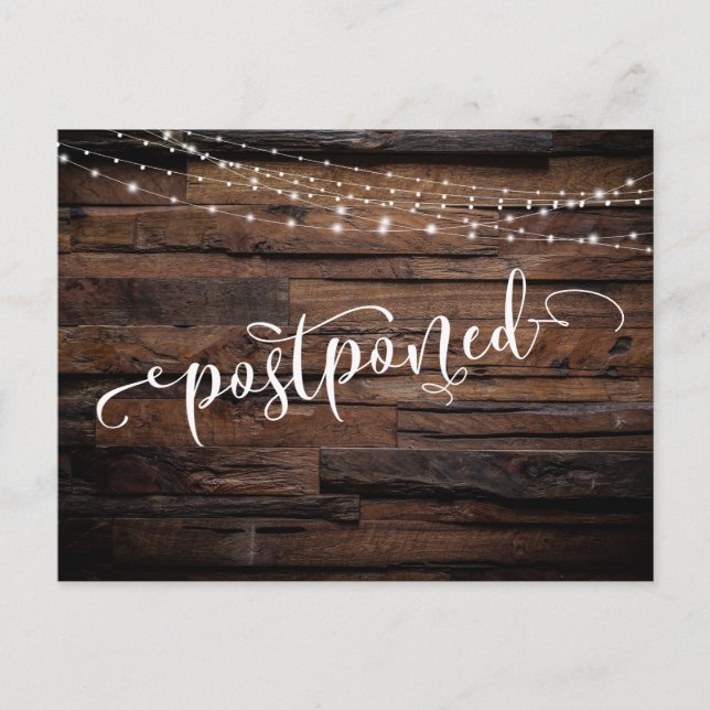 Rustic Wood & Lights Postponed Wedding Notice Postcard (Front)