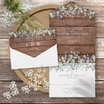 Rustic Wood Sage And Lilac Floral Monogram Wedding All In One Invitation<br><div class="desc">All in one wedding invitation featuring pretty watercolor greenery foliage and elegant modern typography on a rustic wood panels background. The invitation includes a perforated RSVP card that can be individually addressed or left blank for you to handwrite your guest's address details. Designed by Thisisnotme©</div>
