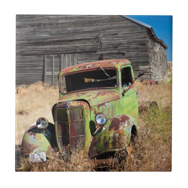 Rusting car in front of abandoned farm tile (Front)