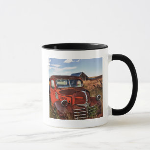 Rusting orange Dodge truck with abandoned farm Mug