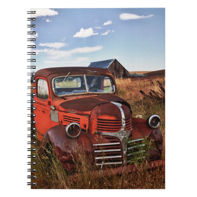 Rusting orange Dodge truck with abandoned farm Notebook (Front)