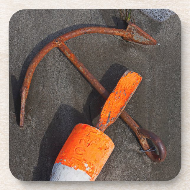 Rusty Anchor And Buoy On A Beach Coaster (Front)