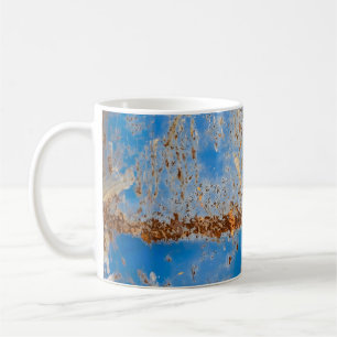 Rusty metal texture, blue scratchy decor. coffee mug