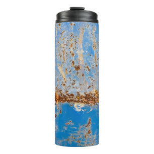 Rusty metal texture, blue scratchy decor. thermal tumbler