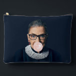 Ruth Bader Ginsburg Blowing Pink Bubble gum    Accessory Pouch<br><div class="desc">Ruth Bader Ginsburg blowing a pink bubble gum with dark blue background.
This artwork is inspired by the iconic Ruth who blazed a trail for women in U.S. Jurisprudence.</div>