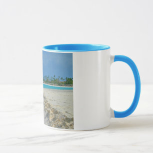 Sable d'Aruba et tasse de surf