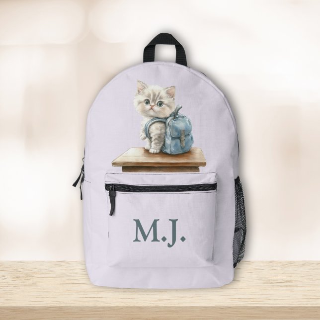 Sac À Dos Imprimé Cute Kitten with Backpack Custom Monogram Backpack (Cute Kitten with Backpack Custom Monogram Backpack on a neutral boho table.)