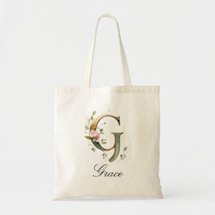 Sac à main élégant en or avec monogramme floral le