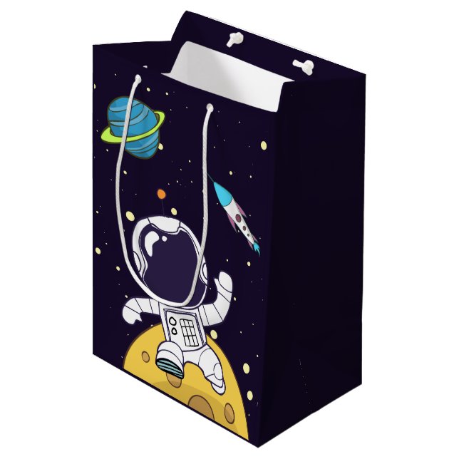 Sac Cadeau Moyen Un astronaute flotte dans l'espace (Devant Angle)