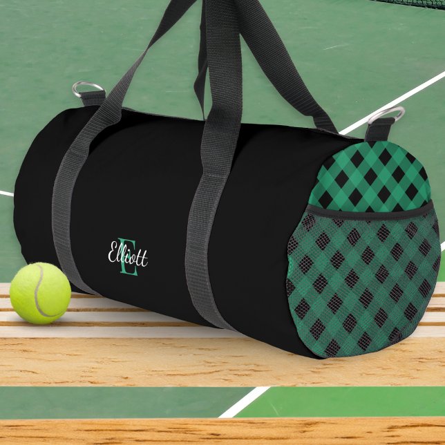 Sac De Sport Monogramme de buffle vert et noir (An elegant duffel bag with monogram, color block black, and green buffalo plaid)