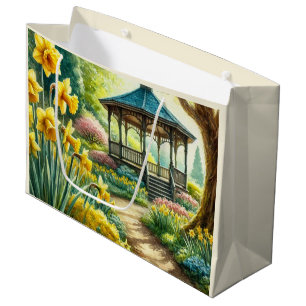Sac en cadeau floral avec jonquilles jaunes et glo
