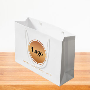 Sacs cadeaux personnalisés avec logo doré et texte