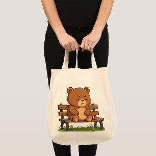 Sad Cute Teddy Bear on Bench – Emotional Cartoon Tote Bag