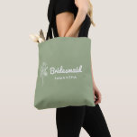 Sage green Bridesmaid Proposal Maid of honour Gift Tote Bag<br><div class="desc">Surprise your best friends with a heartfelt and elegant bridesmaid proposal using this charming floral tote bag! Adorned with beautiful flowers, this tote bag is the perfect way to ask, "Will you be my bridesmaid?" in a meaningful and timeless style. Designed with a romantic, boho-inspired aesthetic, it blends soft, feminine...</div>