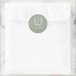 Sage Green Crest Modern Monogram Wedding  Classic Round Sticker<br><div class="desc">Enhance your wedding with the Sage Green Crest Modern Monogram Wedding Classic Round Sticker. This elegant sticker features a soft sage green background, a refined crest design, and a personalized monogram, making it the perfect addition to your invitations, party favours, or wedding decor. The subtle yet sophisticated colour and modern...</div>