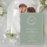 Sage Green Leafy Crest Monogram Photo Wedding Invitation<br><div class="desc">We're loving this trendy, modern sage green wedding invitation! Simple, elegant, and oh-so-pretty, it features a hand drawn leafy wreath encircling a modern wedding monogram. It is personalized in elegant typography, and accented with hand-lettered calligraphy. Finally, it is trimmed in a delicate frame and the back of the card showcases...</div>