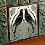 Sage Green Mackintosh Black Birds Art Deco Decor Tile<br><div class="desc">This ceramic tile features two black birds and intricate floral patterns reminiscent of the iconic style of Mackintosh. He was a prominent Scottish architect, designer, and artist of the Art Nouveau movement. Clean lines, geometric shapes, and a strong sense of symmetry characterize his work. These elements are beautifully represented in...</div>