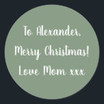 Sage Green Merry Christmas from Mom gift tag<br><div class="desc">Sage green Christmas gift tag sticker with the message, "To Alexander, Merry Christmas! Love Mom xxx" in white typography/ script. To personalize, simply add your name in the personalize this text box. You can also add your own name in the love from section, or change the holiday message. If you...</div>