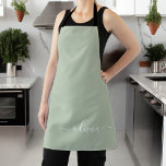 Sage Green Minimalist Modern Monogram Elegant Apron<br><div class="desc">Introducing our Sage Green Minimalist Modern Monogram Elegant Collection: Elevate your aesthetic with serene sophistication and timeless elegance. Our collection showcases minimalist designs in a tranquil sage green hue, complemented by refined monograms tailored to your personal style. From polished stationery to versatile accessories, each piece in our collection is meticulously...</div>