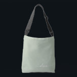 Sage Green Minimalist Modern Monogram Elegant  Crossbody Bag<br><div class="desc">Introducing our Sage Green Minimalist Modern Monogram Elegant Collection: Elevate your aesthetic with serene sophistication and timeless elegance. Our collection showcases minimalist designs in a tranquil sage green hue, complemented by refined monograms tailored to your personal style. From polished stationery to versatile accessories, each piece in our collection is meticulously...</div>