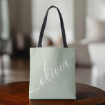 Sage Green Minimalist Modern Monogram Elegant Tote Bag<br><div class="desc">Carry style and sophistication with this Sage Green Minimalist Monogram Tote Bag — a modern essential for everyday use. Featuring a clean, elegant design with your custom initials or name, this personalized tote is perfect for bridesmaids, small business packaging, client gifts, or stylish daily errands. The soft sage green colour...</div>