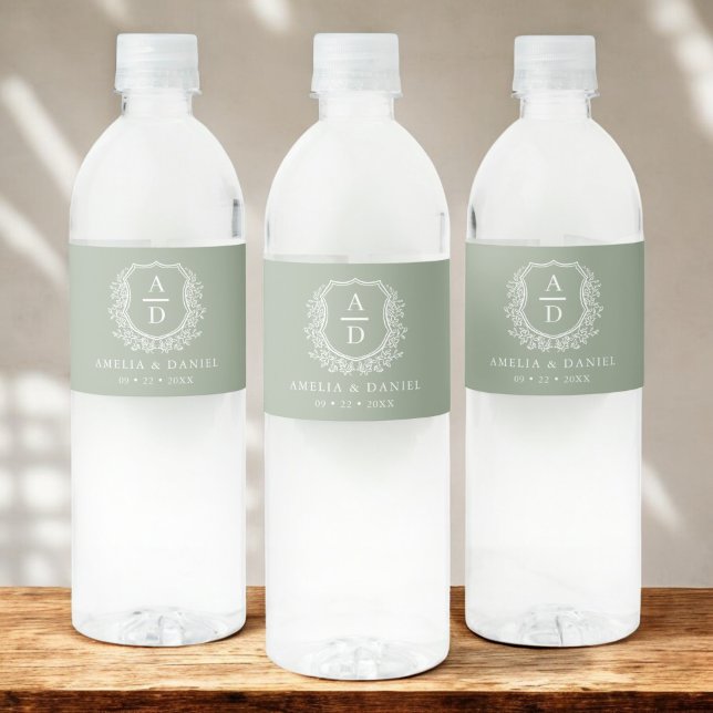 Sage Green Monogram Botanical Wedding Floral Crest Water Bottle Label (Creator Uploaded)