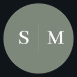 Sage Green Monogram Elegant Wedding Classic Round Sticker<br><div class="desc">Add a touch of elegance to your wedding details with this personalized sticker featuring the couple’s monogram at the centre, creating a refined focal point. The text is beautifully rendered in an elegant serif font, offering a timeless and sophisticated design. Ideal for sealing wedding invitations, favours, or gift bags, this...</div>