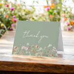 Sage Green Whimsical Wildflower Bridal Shower Thank You Card<br><div class="desc">Express your gratitude with our Terracotta Wildflower Bridal Shower Thank You Card. This beautifully designed card captures the essence of nature's charm, featuring vibrant wildflowers against a warm terracotta backdrop. The delicate wildflowers symbolize the beauty and uniqueness of each moment shared during the bridal shower. The terracotta colour palette adds...</div>
