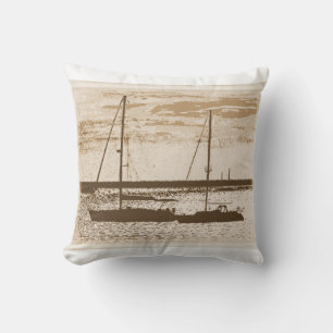 Sail boats on shore at dusk throw pillow