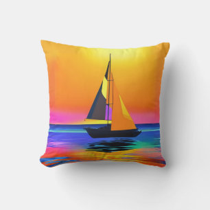 Sailboat Against a Vibrant Ocean Sunset Outdoor Pillow