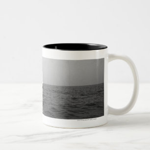 Sailboat on ocean Two-Tone coffee mug