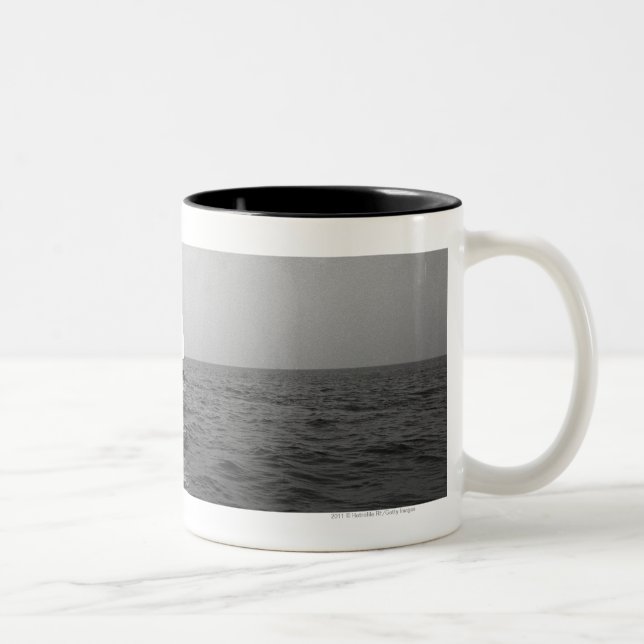 Sailboat on ocean Two-Tone coffee mug (Right)