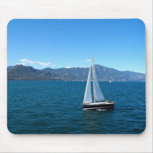 Sailing boat on lake Garda in Italy Mouse Pad