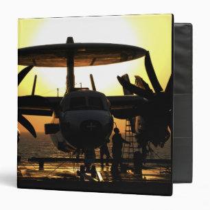 Sailors work on an E-2C Hawkeye aircraft Binder