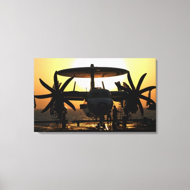 Sailors work on an E-2C Hawkeye aircraft Canvas Print (Front)