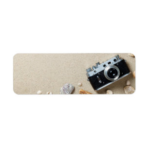 Sand Background. Concept With Old Retro Camera
