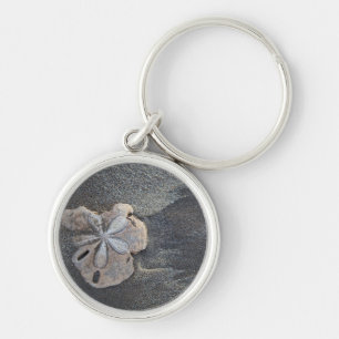 Sand dollar on sand keychain